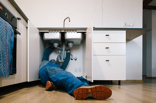 Professional Emergency Plumber technician working in Albertville, AL